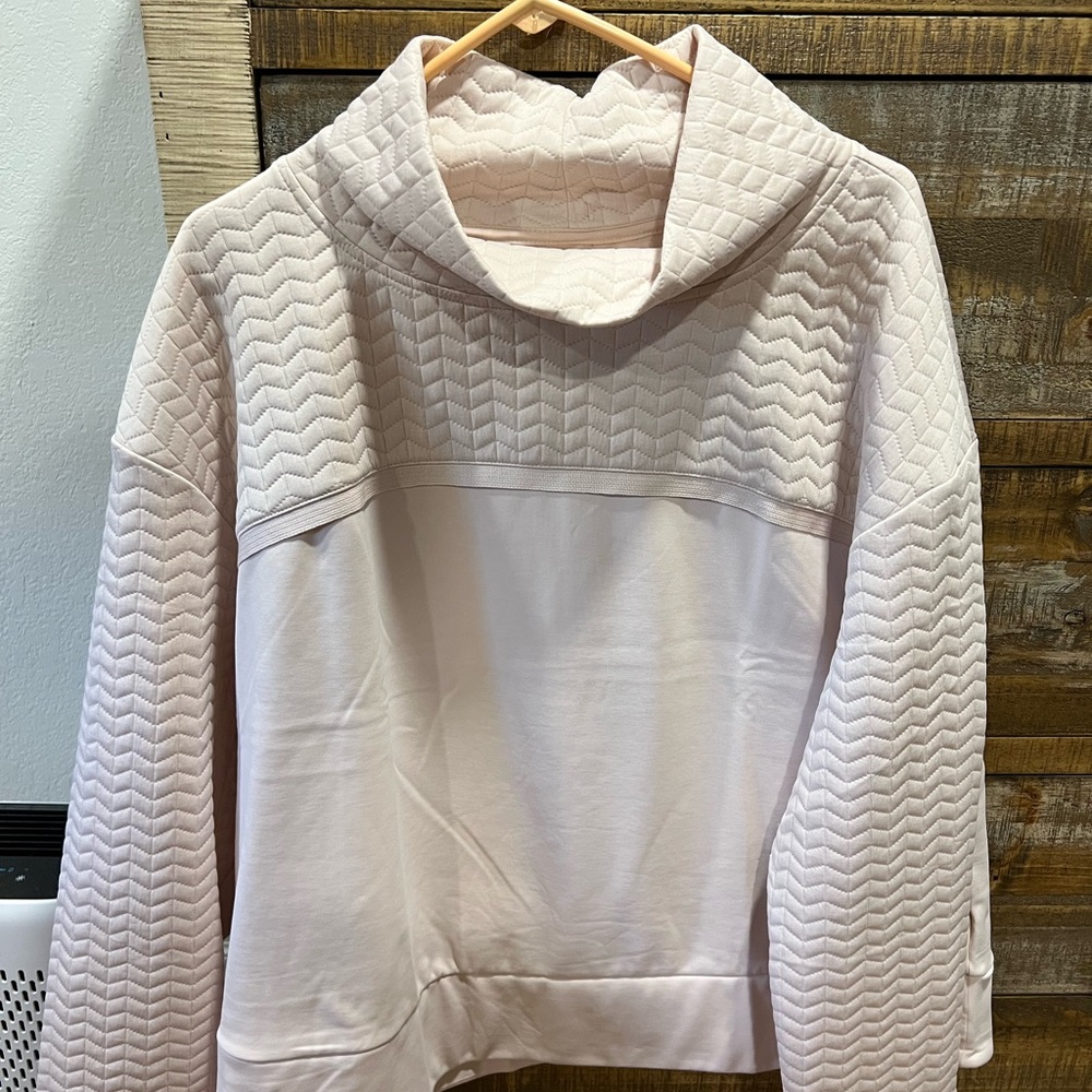 Light pink hoodie with a cowl neck